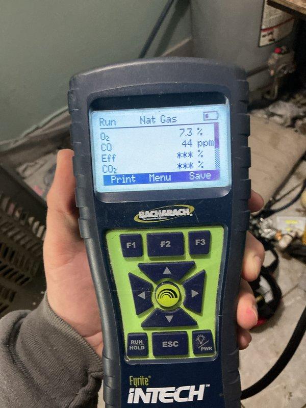 Completed monthly maintenance service on heating system including filter replacement with 20x20x1 filter. Performed combustion analysis using Bacharach Fyrite INTECH analyzer, which showed acceptable O2 levels at 7.3% and CO at 44 ppm. Verified thermostat operation in heat mode with proper temperature differential maintained between current (69°) and set point (74°).