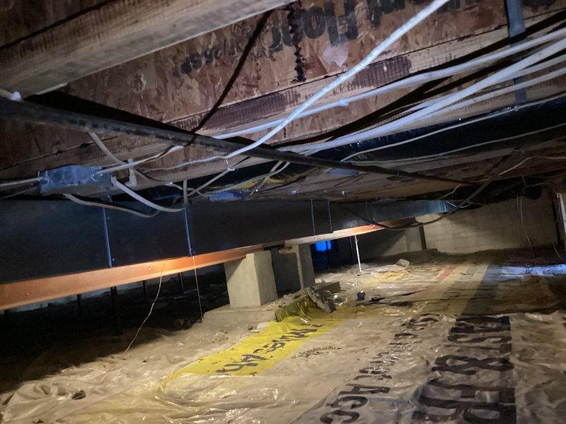 Conducted an estimate for installing a gas line to service a 5-burner cooktop. Inspection of the kitchen revealed an existing countertop installation requiring gas connection. Assessment of the crawlspace confirmed feasibility of running a new gas line through the accessible under-floor area where utilities are already present.