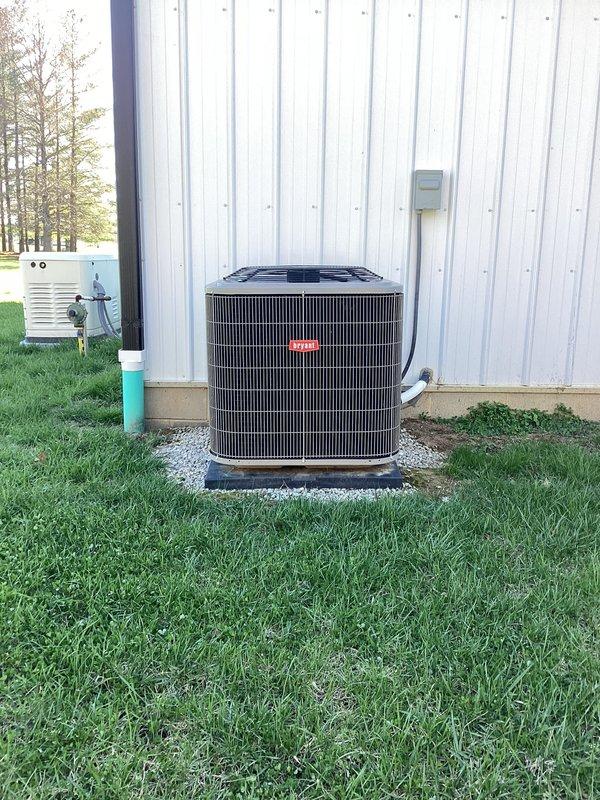 Performed complimentary tune-up on Bryant heating system. Inspected unit thoroughly for leaks as previous contractors had reported and repaired an installation-related leak issue. Verified system operation, checked all connections, and confirmed the repair integrity with no active leaks detected. Left replacement air filter alongside unit for future use.