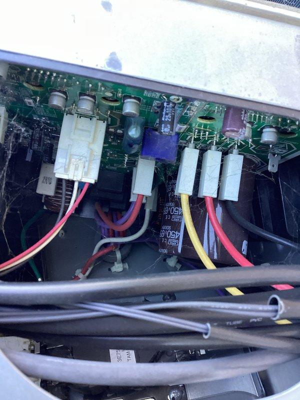 Responded to no-heat service call for system less than 10 years old. Discovered flooding beneath house had saturated air filter and compromised ductwork, with water damage to tubing located under the structure. System power was disconnected for safety. Replaced filter under warranty and documented thermostat reading of 48°F along with control board condition for warranty claim processing.