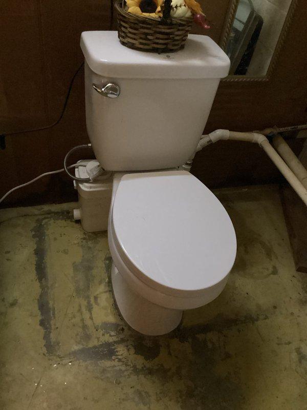 Responded to complimentary service call for toilet issue described as humming with bowl half full of water. Inspected toilet system and surrounding plumbing connections. Resolved the humming problem and restored proper water level in bowl to ensure normal flushing operation.