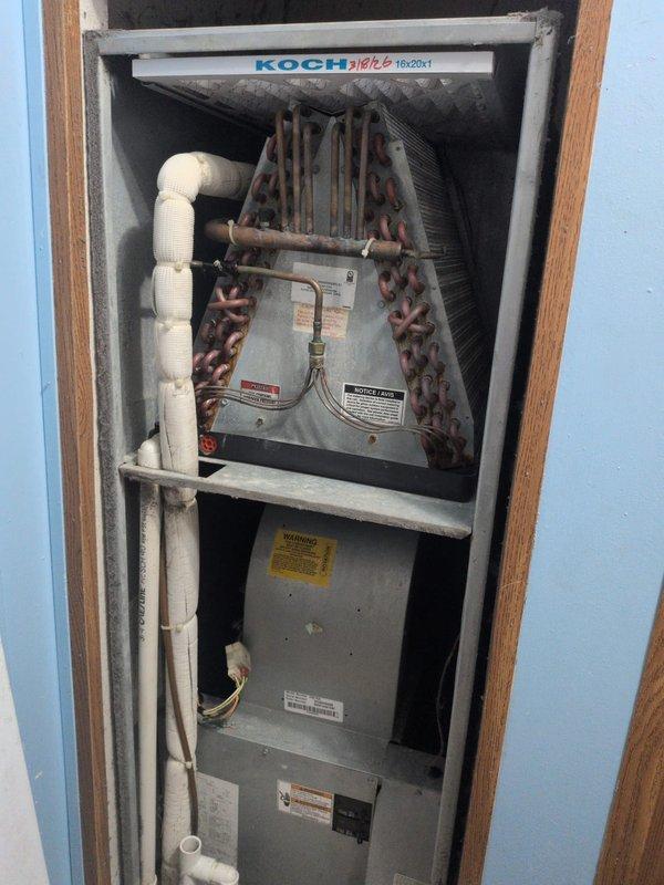 Completed monthly maintenance on Koch HVAC system, which included inspection of the A-coil evaporator and condensate drainage system. Replaced both 16x20x1 and 20x20x1 filters as part of regular service. Verified proper system operation with Honeywell Home ProSeries thermostat showing normal cooling function at 72°F.