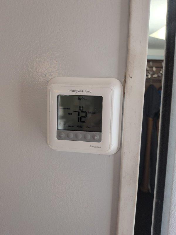 Completed monthly maintenance on Koch HVAC system, which included inspection of the A-coil evaporator and condensate drainage system. Replaced both 16x20x1 and 20x20x1 filters as part of regular service. Verified proper system operation with Honeywell Home ProSeries thermostat showing normal cooling function at 72°F.