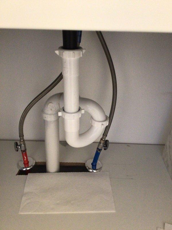 Responded to a service call for multiple plumbing issues throughout the residence. Tested and repaired the kitchen sink that had previously leaked severely into the cabinet below. Corrected reversed hot/cold connections at utility sink and fixed leaks at utility sink, master bathroom, and guest bathroom fixtures. All installations were verified for proper function and absence of leaks.