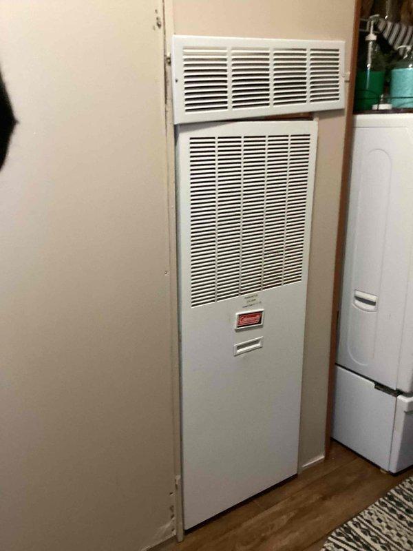 Diagnosed non-functioning air conditioning system that was not producing cold air. Inspected thermostat settings and verified system configuration. Performed comprehensive check of indoor air handler unit to identify source of cooling failure.