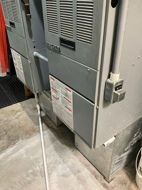 Conducted heat maintenance inspection on dual furnace system revealing severe safety hazards including rusted/corroded heat exchangers, scorched circuit board, and damaged wiring harness bridle in both units. Documented condition of existing HVAC equipment and ductwork system via photographs. Recommended complete replacement of both furnaces due to critical safety concerns and provided full system estimate for new installation.