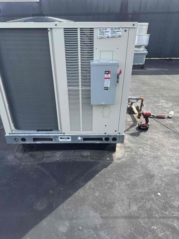 Successfully installed a commercial RTU system with natural gas furnace on the rooftop before business opening hours. Completed electrical connections to the control board with proper wiring of all terminals and verified proper operation of the disconnect switch. System was powered up, tested, and left operational with all connections secure.