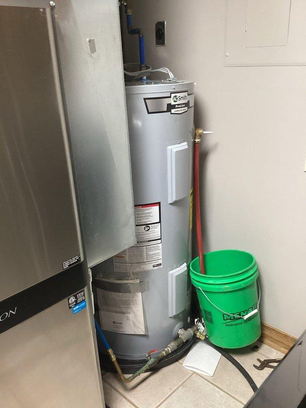 Successfully installed a new 50-gallon short A.O. Smith water heater in the utility closet, including proper connection of hot and cold water lines using PEX piping with appropriate shutoff valves. Additionally, installed a no-salt water conditioner system to improve water quality and extend the lifespan of the new unit, with all connections properly secured and tested for leaks.