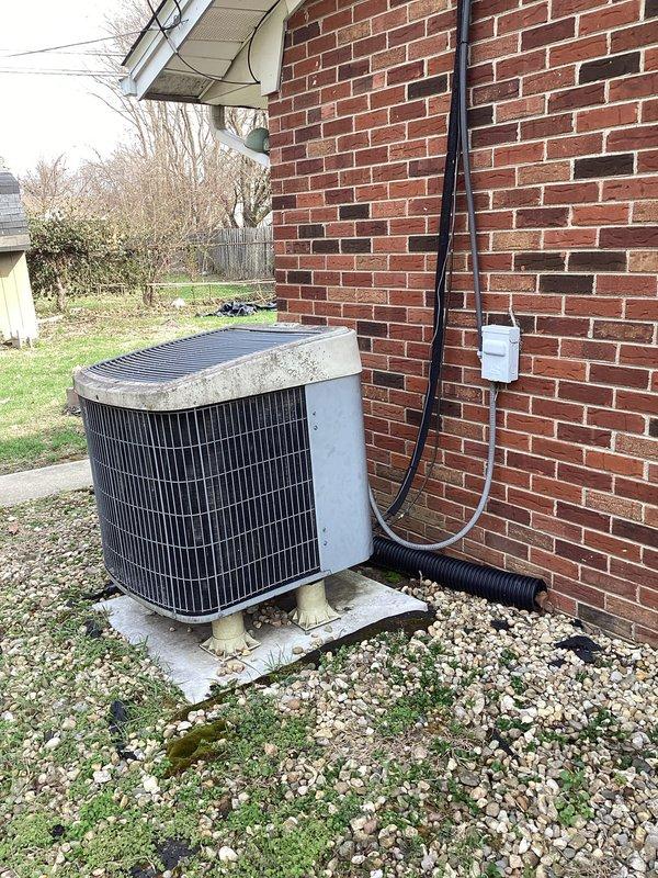 Performed monthly maintenance service on residential cooling system, including replacement of 16x20x1 filter. Inspected outdoor condenser unit, noting some debris accumulation on top surface requiring cleaning. Verified thermostat operation and confirmed system was properly set to heat mode with fan running continuously at 64°F.