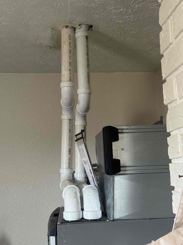 Completed warranty service on a Lennox HVAC system installation, repairing the PVC ventilation piping that connects to the Rheem water heater. Inspected and secured all connection points and elbow joints in the exhaust system, ensuring proper installation and code compliance.