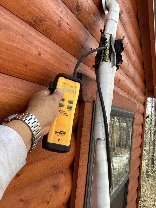Performed diagnostic testing on MR. Cool mini-split system that had previously been serviced under warranty but continued to experience heating/cooling failure. Conducted leak detection testing on refrigerant lines at exterior wall penetration and inspected interior evaporator components after removing access panel, verifying system condition as requested by customer.