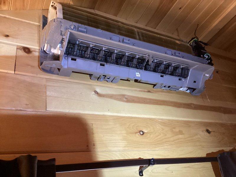 Performed diagnostic testing on MR. Cool mini-split system that had previously been serviced under warranty but continued to experience heating/cooling failure. Conducted leak detection testing on refrigerant lines at exterior wall penetration and inspected interior evaporator components after removing access panel, verifying system condition as requested by customer.