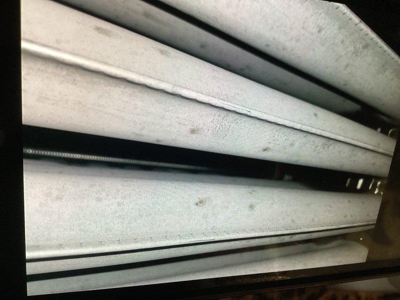 Performed basic monthly maintenance on a CCH system. Inspected heat exchanger and cooling coils, documenting condition with photos. Noted existing 20x25x4 filter (not included in service).