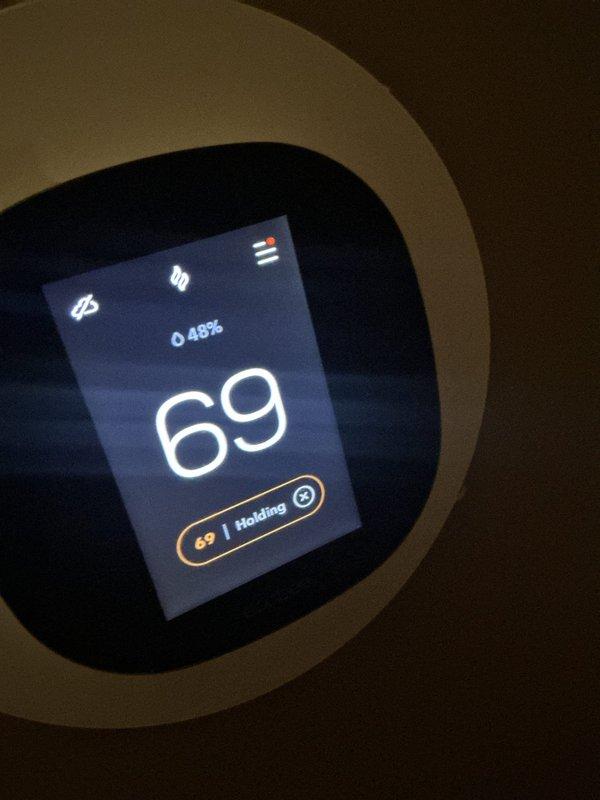 Performed routine maintenance on two heat pump systems as part of the Basic Monthly service plan, including replacement of two 20x20x1 air filters. Diagnosed and monitored previous thermostat glitch where system was calling for heat while temperature was dropping; confirmed issue has self-resolved and system is now maintaining proper temperature control with heat setpoint at 72° and actual temperature reading of 68-69°.