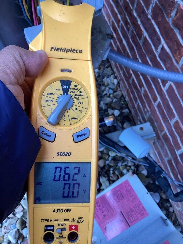 Completed monthly heating maintenance on residential HVAC system including CCH (clean, check, and adjust) procedures with 16x25x1 filter replacement. Verified system operation with current draw reading of 0.62A, confirmed thermostat programming and functionality showing proper temperature control at 71°F with fan in auto mode. All equipment operating within normal parameters with no issues identified.