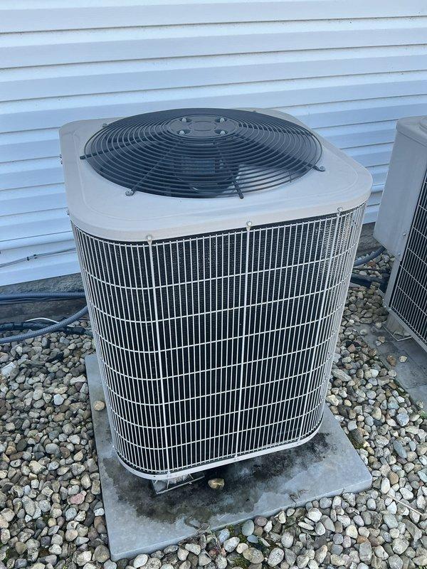 Completed basic monthly maintenance on two-system heat setup. Inspected indoor air filter system with 16x20x4 filter and outdoor condenser unit, verifying operational status and documenting equipment condition for both systems.