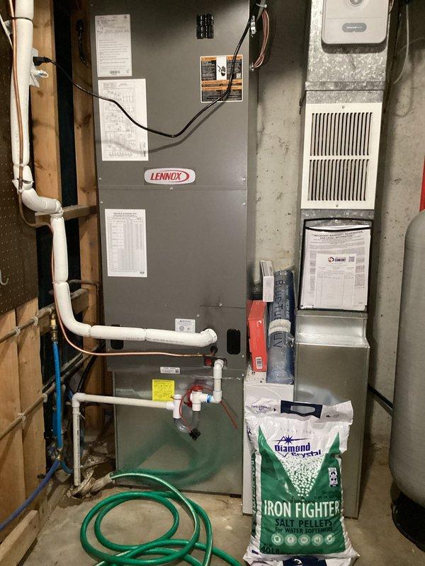 Completed comprehensive plumbing inspection as part of prepaid membership maintenance visit. Inspected all accessible plumbing fixtures including toilet supply line connections, shut-off valves, and water closet installation in bathroom area. Verified proper operation of flexible braided supply lines and metal fittings with no visible leaks detected. Examined basement mechanical room plumbing infrastructure including PVC drainage system, water softener connections, and associated piping runs. All fixtures and connections found to be functioning properly with no immediate repairs required.