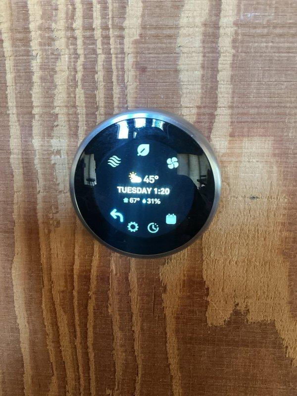 Completed monthly heating maintenance on gas furnace system. Performed combustion analysis showing 45 ppm CO, 13.3% efficiency on natural gas unit. Verified thermostat operation displaying 45°F set point with system running in heating mode. Customer granted remote garage access for service completion.