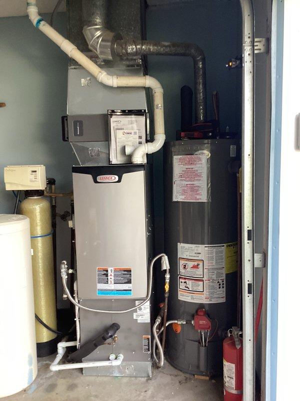 Completed comprehensive heating maintenance on Lennox furnace system as part of comfort care program. Performed full system inspection including visual assessment of furnace unit, PVC venting, ductwork connections, and gas supply lines. Verified all safety labels and operational specifications, confirmed proper clearances in mechanical closet, and documented equipment condition with photographic records for service history.