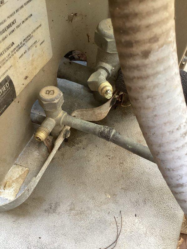 Responded to no cooling call on Goodman model VSX130361EA condensing unit. Upon arrival, performed system diagnostics and visual inspection of outdoor unit components. Inspected refrigerant line set connections, service valves, and electrical specifications. Unit showed signs of normal wear consistent with age but no immediate visual damage to major components. Documented equipment condition including valve assemblies, insulated suction line, and manufacturer data plate for service records.