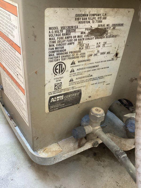 Responded to no cooling call on Goodman model VSX130361EA condensing unit. Upon arrival, performed system diagnostics and visual inspection of outdoor unit components. Inspected refrigerant line set connections, service valves, and electrical specifications. Unit showed signs of normal wear consistent with age but no immediate visual damage to major components. Documented equipment condition including valve assemblies, insulated suction line, and manufacturer data plate for service records.