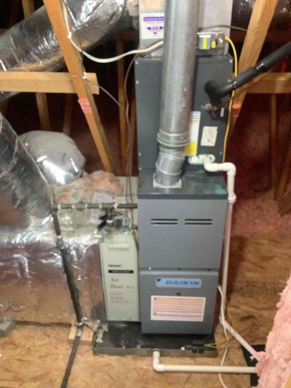 Completed comprehensive heating maintenance service on Daikin furnace system installed in attic space. Performed full system inspection including heat exchanger examination, burner assembly cleaning, ignition system testing, blower motor operation verification, and condensate drain line inspection. Verified proper airflow through ductwork, tested safety controls and limit switches, checked electrical connections, and confirmed thermostat operation and calibration. Customer renewed maintenance membership for coverage extending through April 2026, and system is operating within manufacturer specifications with all components functioning properly.