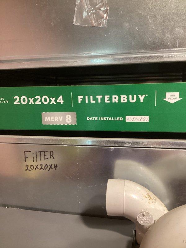 Performed heating maintenance service on HVAC system. Inspected existing 20x20x4 air filter dated 02/24/22 and noted customer's comfort club membership had expired but service was owed. Filter size 20x20x4 was not included in standard service package and customer did not have replacement on hand. Verified filter compartment specifications and documented current filter condition. Also observed tankless water heater installation during service visit, noting proper venting connections and plumbing configuration. System operational at time of departure.
