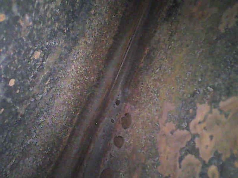 Completed basic monthly maintenance visit for heating system. Upon inspection, discovered significant corrosion and deterioration on heat exchanger components and surrounding metal surfaces, indicating potential safety concerns and long-term exposure to moisture. Documented extensive rust damage with photographic evidence for customer review and future reference, recommending further evaluation and potential equipment replacement due to severity of corrosion observed.