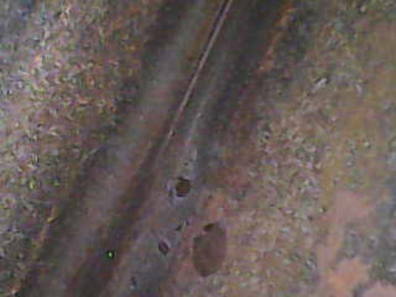 Completed basic monthly maintenance visit for heating system. Upon inspection, discovered significant corrosion and deterioration on heat exchanger components and surrounding metal surfaces, indicating potential safety concerns and long-term exposure to moisture. Documented extensive rust damage with photographic evidence for customer review and future reference, recommending further evaluation and potential equipment replacement due to severity of corrosion observed.