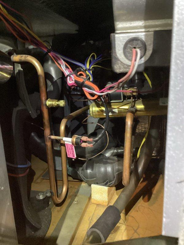 Returned to site and successfully replaced defective heat exchanger in heating unit. Removed old heat exchanger assembly, installed new unit, and reconnected all copper refrigerant lines, electrical connections, and mounting hardware. Verified proper installation of insulated components, tested system operation, and confirmed unit is functioning correctly with no leaks detected.