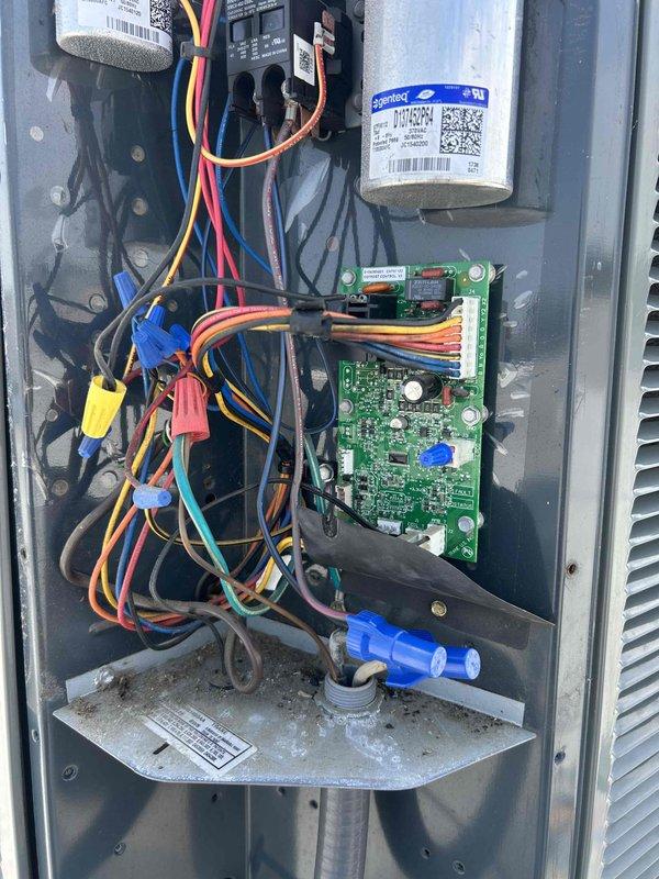 Responded to no cooling complaint on rooftop unit. Performed system diagnostics and inspected control panel, circuit boards, capacitor, and electrical connections. Documentation photos taken of control cabinet interior showing wiring, control boards, and components for service records.
