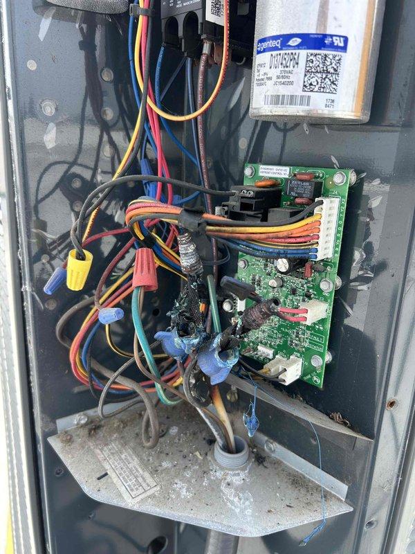 Responded to no cooling complaint on rooftop unit. Performed system diagnostics and inspected control panel, circuit boards, capacitor, and electrical connections. Documentation photos taken of control cabinet interior showing wiring, control boards, and components for service records.