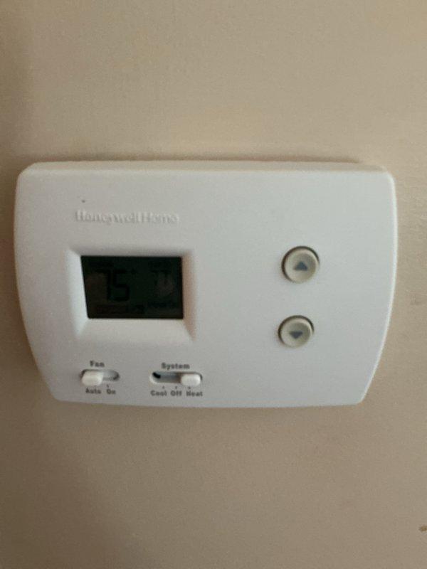 Completed routine heating maintenance on residential HVAC system. Performed comprehensive inspection of furnace components including blower assembly and squirrel cage fan. Verified blower wheel operation and inspected housing for proper airflow and structural integrity. Checked all accessible internal components for wear, dust accumulation, and operational efficiency. Inspected and tested Honeywell Home thermostat for proper functionality, verifying display operation and control settings for fan and system modes. Confirmed thermostat communication with heating system and proper temperature control response. All components found to be in satisfactory working condition with normal operational wear patterns observed.