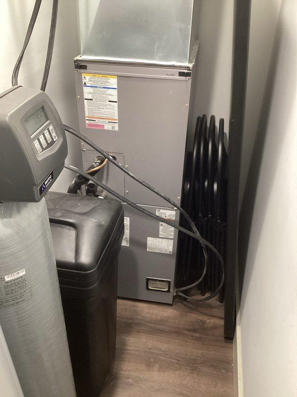 Completed basic monthly HVAC maintenance on heating system. Inspected air handler unit, thermostat operation, and associated components. System found operating within normal parameters with thermostat displaying proper temperature readings and controls functioning correctly.