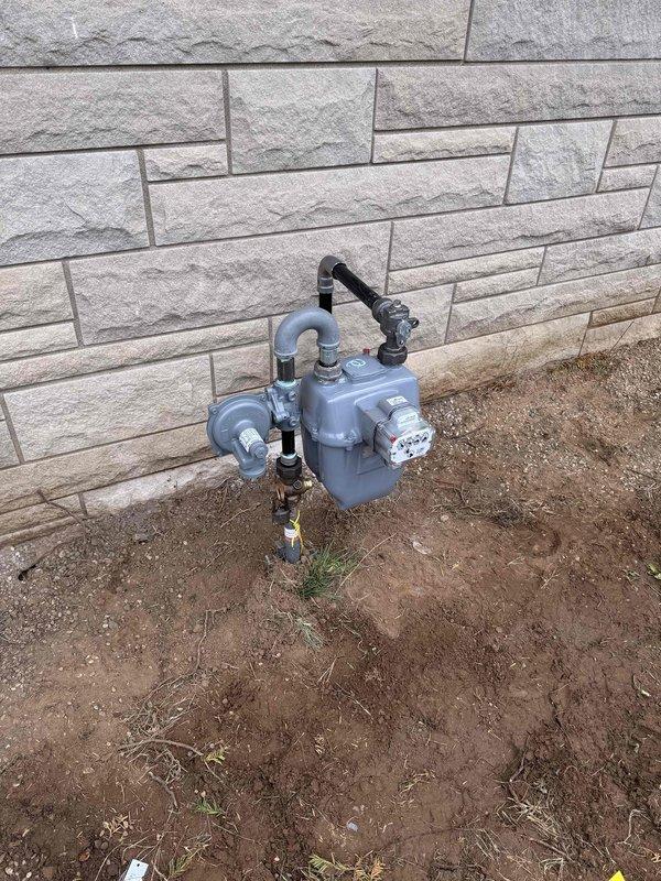 Completed furnace installation warranty service by connecting gas meter to furnace and performing initial fire-off. Gas line had been previously installed and meter set by gas company; returned to site to complete final connections and system startup. Verified all gas piping connections, tested for leaks, and successfully fired furnace to confirm proper operation.