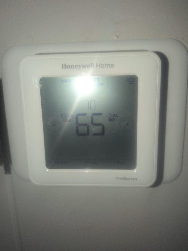 Completed comprehensive monthly maintenance on residential forced-air heating system, including CCH service protocol with 16x25x1 filter replacement. Performed full system inspection of furnace components, burner assembly, gas valves, and control boards, verified proper operation of Honeywell Home ProSeries WiFi thermostat showing heat mode active at 65 degrees, and confirmed all safety controls and ductwork connections functioning within manufacturer specifications.