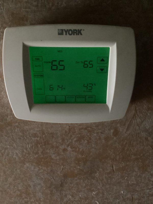 Completed basic monthly heating maintenance on a two-system setup consisting of a York furnace and air handler. Performed standard inspection procedures, verified thermostat operation showing proper temperature control at 65 degrees, and checked both heating units for proper function. Customer will need to provide their own 20x25x4 filter as it is not included in this maintenance service.