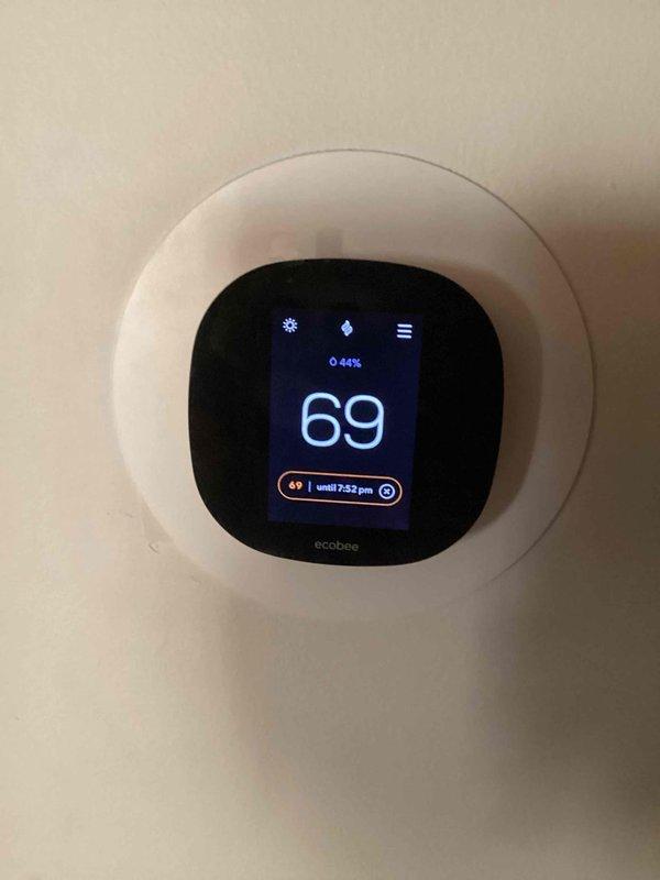 Completed monthly HVAC maintenance including CCH system inspection and filter replacement. Replaced dirty 20x25x1 pleated air filter with new filter as part of basic monthly service plan. Verified thermostat operation showing system maintaining 69°F setpoint with proper cooling mode functionality.