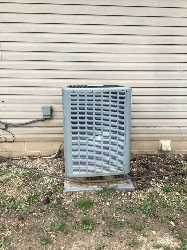 Completed basic monthly cooling maintenance on residential CCHP system. Inspected outdoor condenser unit positioned on concrete pad, verified proper clearances and examined electrical connections at junction box. Accessed air handler, confirmed 16x20x1 filter availability and inspected internal components including blower assembly and filtration system for proper operation.