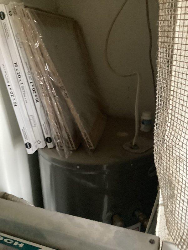 Completed basic monthly cooling maintenance on residential CCHP system. Inspected outdoor condenser unit positioned on concrete pad, verified proper clearances and examined electrical connections at junction box. Accessed air handler, confirmed 16x20x1 filter availability and inspected internal components including blower assembly and filtration system for proper operation.