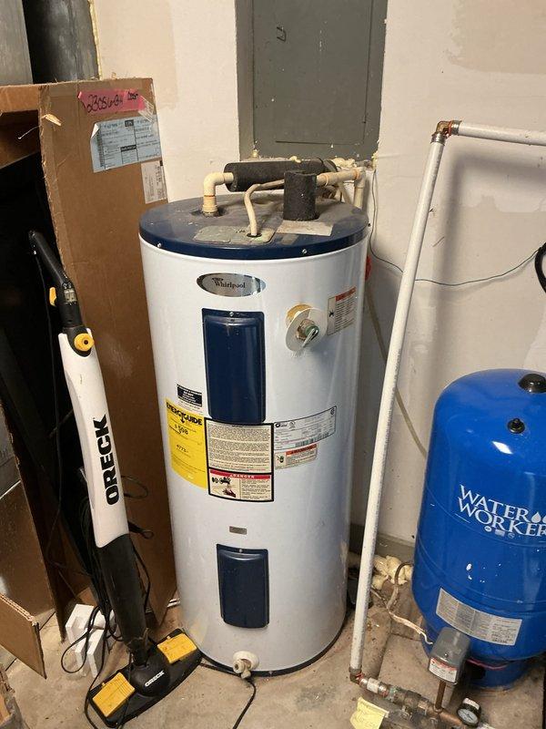 Completed preventive maintenance inspection on residential cooling system. Customer reported high electric bill concerns. Verified thermostat operation and settings at 63°F on Honeywell Home ProSeries unit. Inspected mechanical equipment room including water heater, pressure tank, and associated plumbing connections. Documented all equipment conditions through photographic records per monthly filter service protocol. System operational at time of departure.