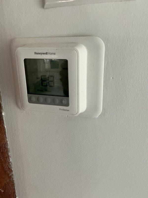 Completed preventive maintenance inspection on residential cooling system. Customer reported high electric bill concerns. Verified thermostat operation and settings at 63°F on Honeywell Home ProSeries unit. Inspected mechanical equipment room including water heater, pressure tank, and associated plumbing connections. Documented all equipment conditions through photographic records per monthly filter service protocol. System operational at time of departure.