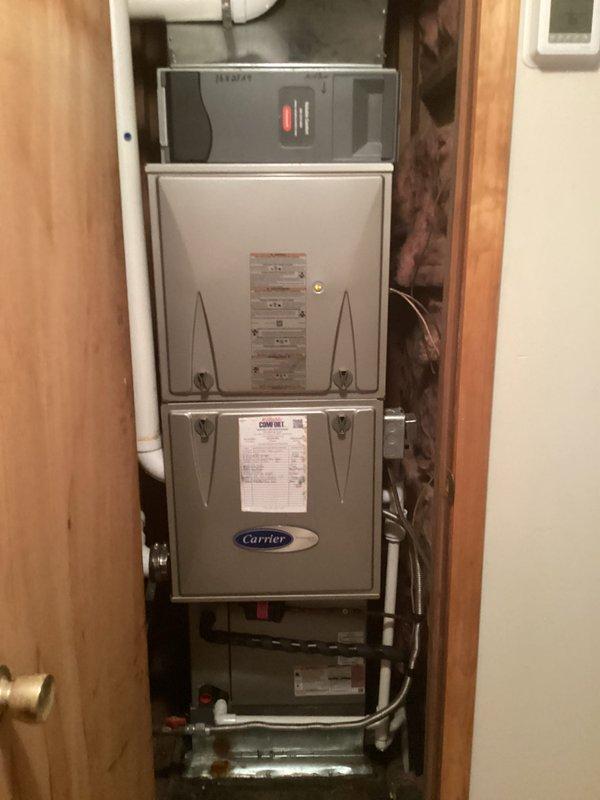 Completed monthly recurring basic heating maintenance visit on Carrier furnace system with Honeywell ProSeries thermostat. Performed standard heating system inspection, replaced 16x25x4 air filter, verified thermostat operation showing 76°F in heating mode, and confirmed all components including PVC condensate drainage, gas connections, and electrical systems were functioning properly. System operational with no issues found.