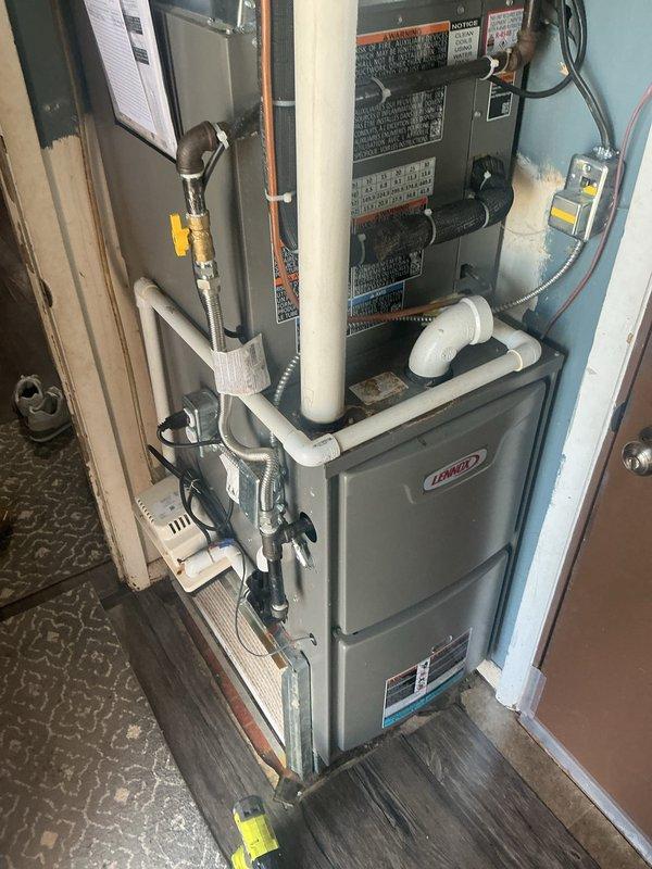 Completed annual cooling maintenance on Lennox HVAC system. Performed comprehensive inspection of furnace unit, air handler, refrigerant lines, and condensate drainage system. Verified thermostat operation showing proper temperature control at 72°F with setpoint of 66°F. Inspected electrical connections, control board, and gas valve assembly. Confirmed all components operating within normal parameters. Installed 16x25x1 air filter per maintenance agreement specifications.