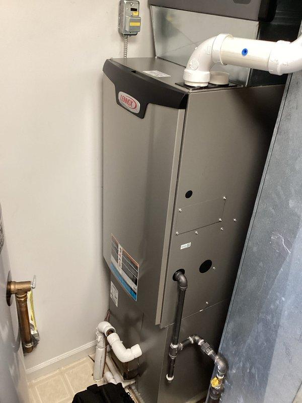 Completed comprehensive comfort coverage maintenance on Lennox heating and cooling system. Performed thorough inspection of indoor furnace unit and outdoor condensing unit, verified proper operation of all components including gas connections, electrical connections, condensate drainage, and refrigerant lines. Renewed service agreement extending coverage through 03/18/2026 with 20x20x4 filter media included in plan. All systems operating within manufacturer specifications with no deficiencies noted.