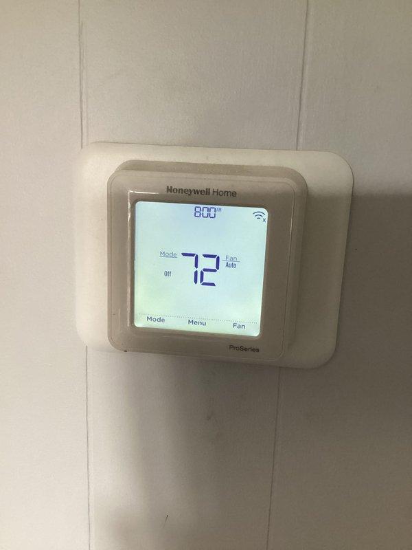 Completed monthly maintenance service on combined cooling and heating system. Performed comprehensive inspection of Lennox furnace unit and associated HVAC equipment located in basement mechanical room. Checked thermostat operation and confirmed Honeywell Home ProSeries digital unit displaying proper temperature readings at 72 degrees with system in off mode and fan set to auto. Verified WiFi connectivity functioning correctly. Inspected furnace components, ductwork connections, and PVC condensate drainage. Documented equipment condition through photographic records. Customer requires 20x20x4 filter which was not included in this service visit.
