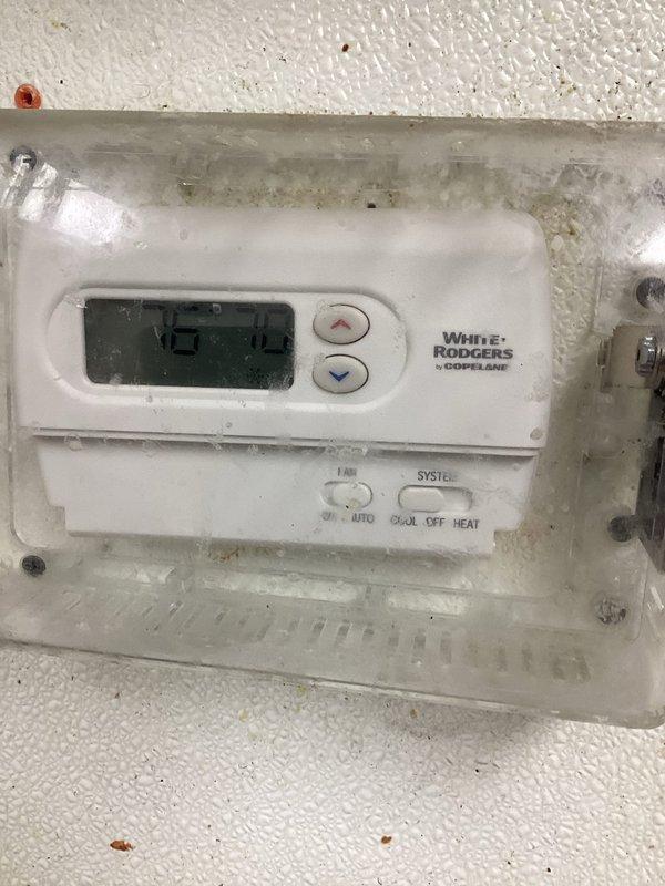 Responded to service call for frozen evaporator coil on commercial rooftop package unit. Upon arrival, confirmed coil was completely iced over, preventing proper system operation. Due to extent of ice buildup, unable to immediately diagnose root cause. Scheduled return visit once coil fully defrosts to perform comprehensive diagnostic testing and identify underlying issue causing freeze-up condition, which may include refrigerant charge verification, airflow measurement, and control sequence evaluation.