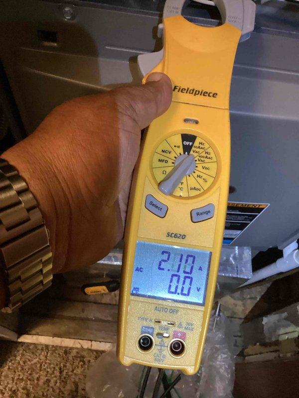 Completed comprehensive heating maintenance on CCHP system. Performed electrical diagnostics using digital multimeter, verified blower motor operation and amp draw within specifications at 2.10 amps. Inspected and tested Lennox digital thermostat, confirmed proper communication and temperature control functionality with system operating in heating mode set to 72°F. Installed new 20x25x4 filter and renewed maintenance agreement through June 2026.