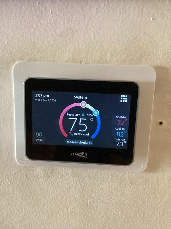 Completed comprehensive heating maintenance on CCHP system. Performed electrical diagnostics using digital multimeter, verified blower motor operation and amp draw within specifications at 2.10 amps. Inspected and tested Lennox digital thermostat, confirmed proper communication and temperature control functionality with system operating in heating mode set to 72°F. Installed new 20x25x4 filter and renewed maintenance agreement through June 2026.