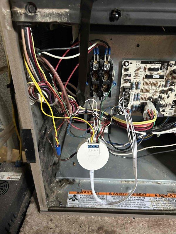 Responded to service call for air conditioning system with suspected low refrigerant levels. Performed diagnostic inspection of HVAC unit's electrical compartment and control systems. Inspected capacitor, contactor, terminal connections, and control board wiring for proper operation and secure connections.